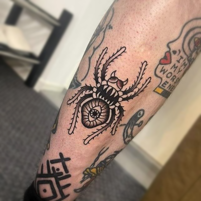 Black traditional spider flash tattoo